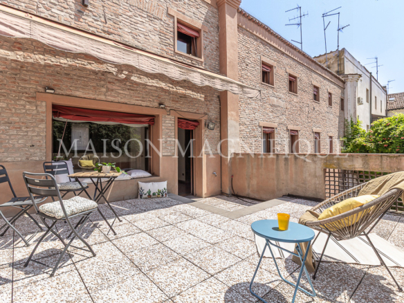 Appartamento su più livelli con terrazzo, garage e posto auto